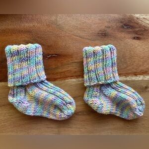 Last chance! 
Hand knit Baby Socks—that will actually stay on your baby’s feet!